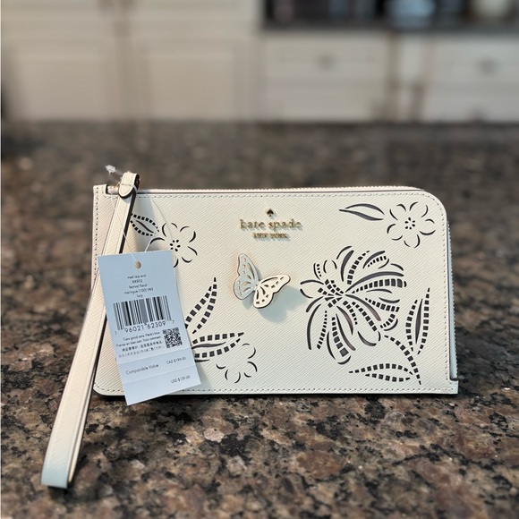 kate spade Handbags - Kate Spade ♠️ Lucy Festival Perforated Floral Wristlet